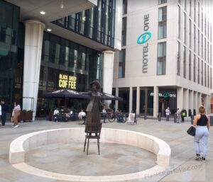 Manchester Weekend away: Outside Hotel Motel One Manchester in St Peter's Square, there is the statue of Emmeline Pankhurst, leader of the suffragette movement and the Meeting Circle which surrounds it.